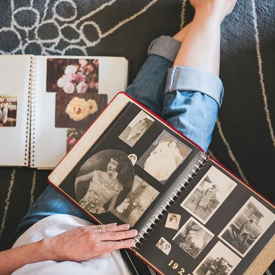 Woman looking photo album