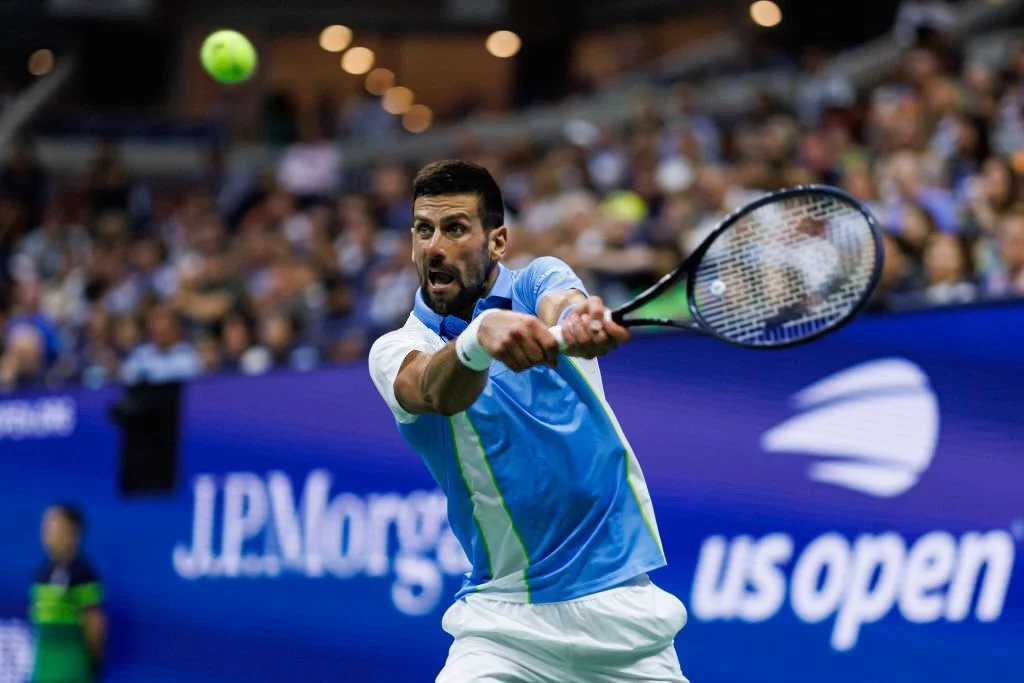 Novak Djokovic hits a backhand in the semifinal of the US Open