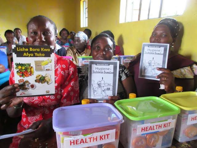Children studying with teacher