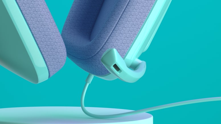 Audífonos gaming Logitech G335 en color menta, mostrando su diseño ligero y diadema de suspensión.