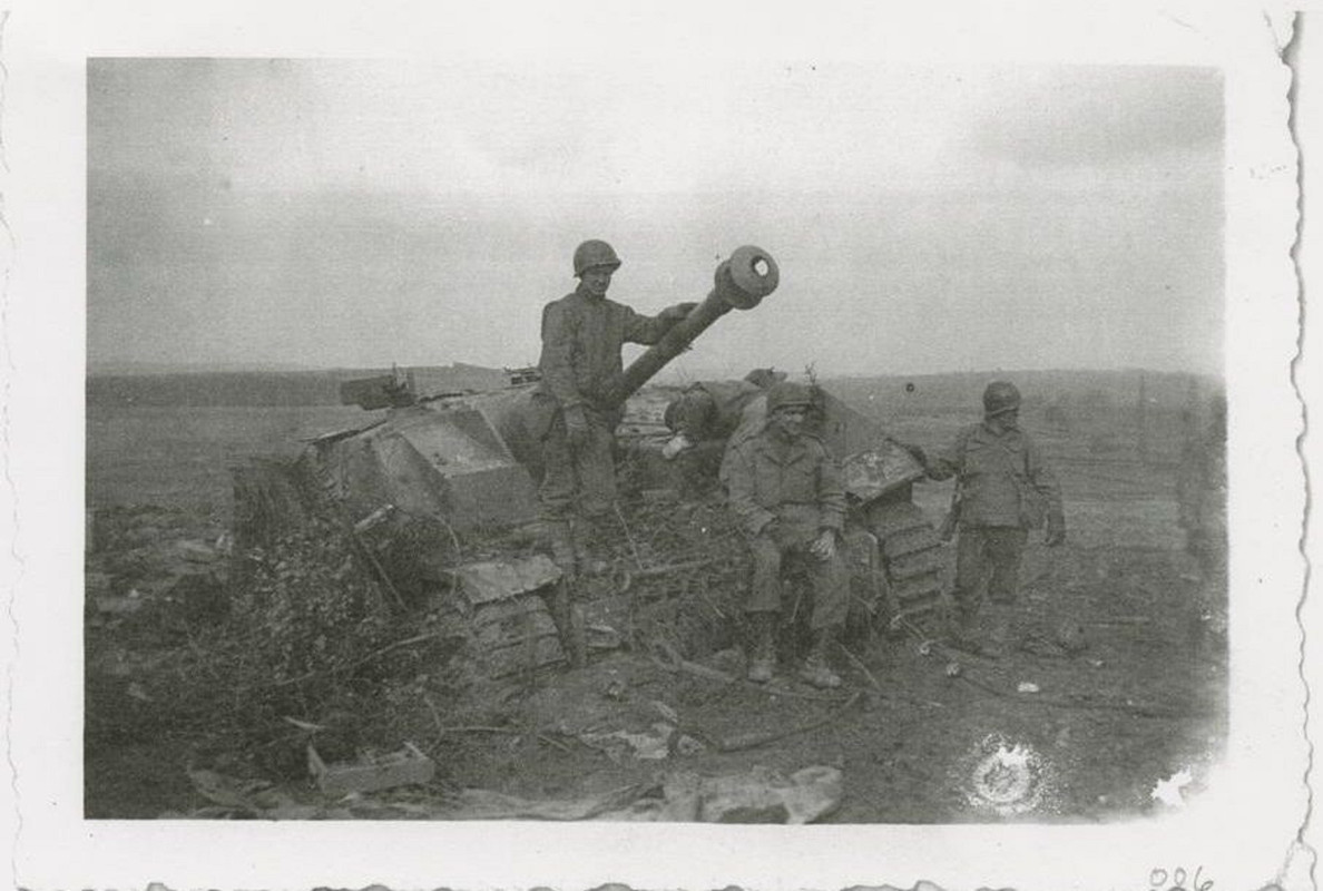 photographs of soldiers around tanks in Germany.  (1)