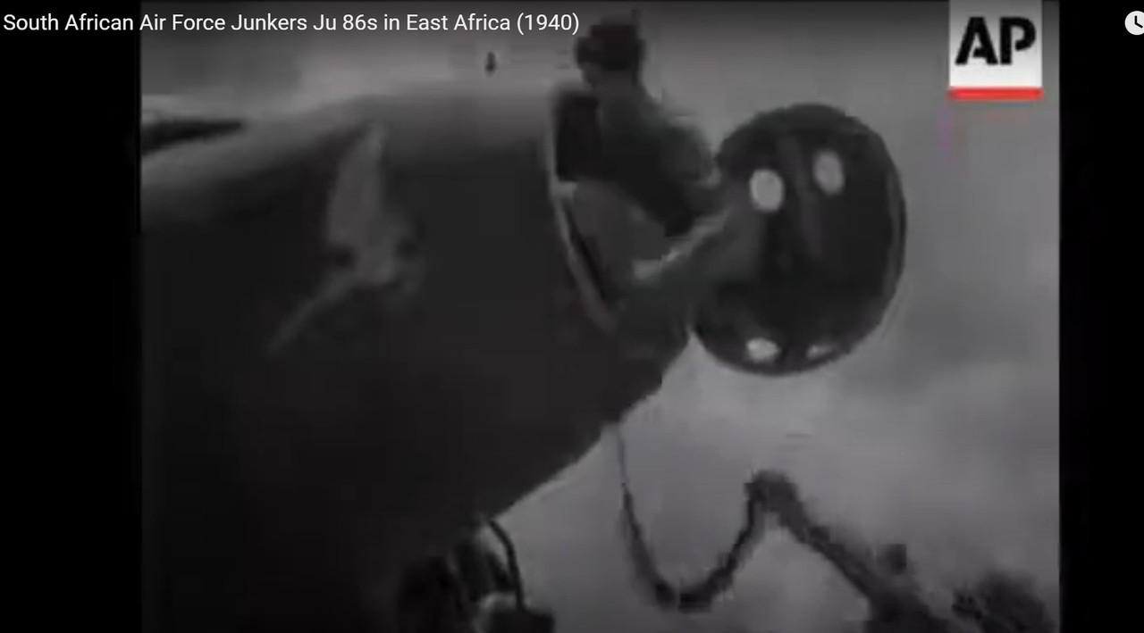 Loading ammo belts for Nose MG Ju86Z (movie South African Ju 86 in East Africa)