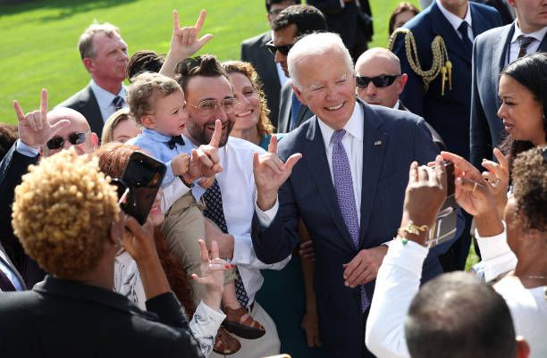 washington-dc-u-s-president-joe-biden-signs-i-love-you-in-american-sign-language-as-he-greets