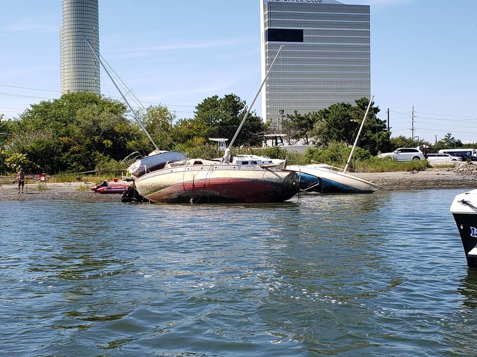 Sailboat graveyard at Farley marina BASS BARN