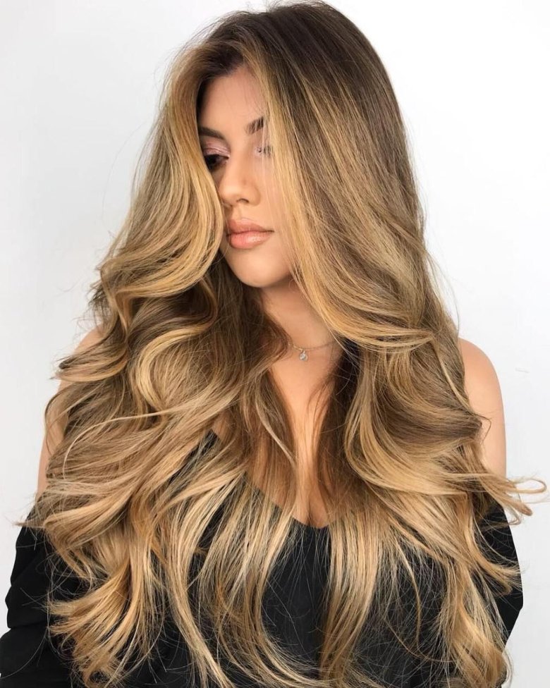 Honey blonde on hair with large curls