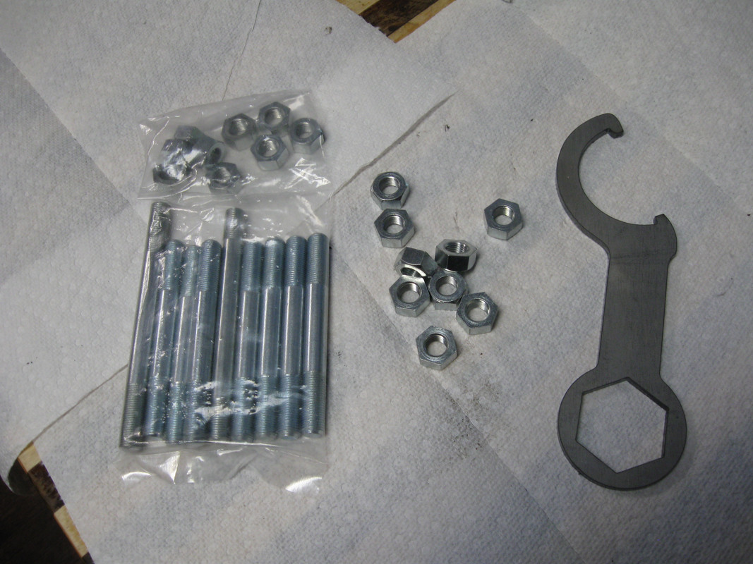 Plunger mount studs and tool