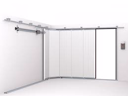 Porte de garage sectionnelle à ouverture coulissante latérale