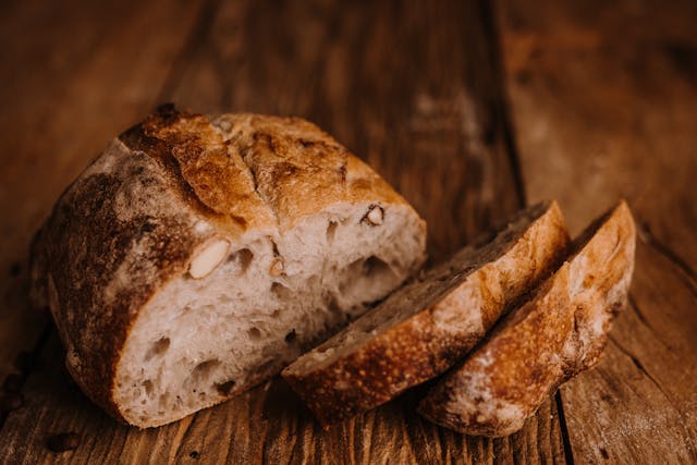 A baker kneading dough