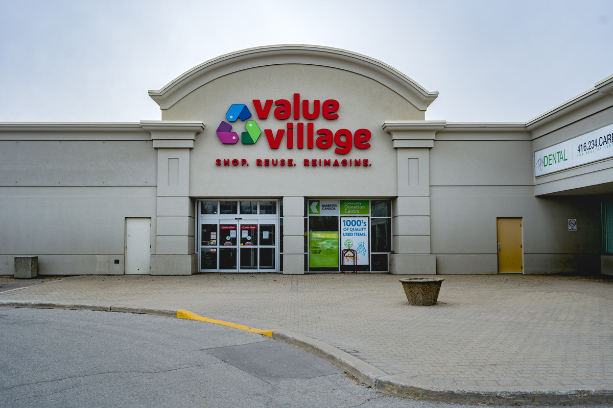 Organized aisles of a thrift or value retail store.