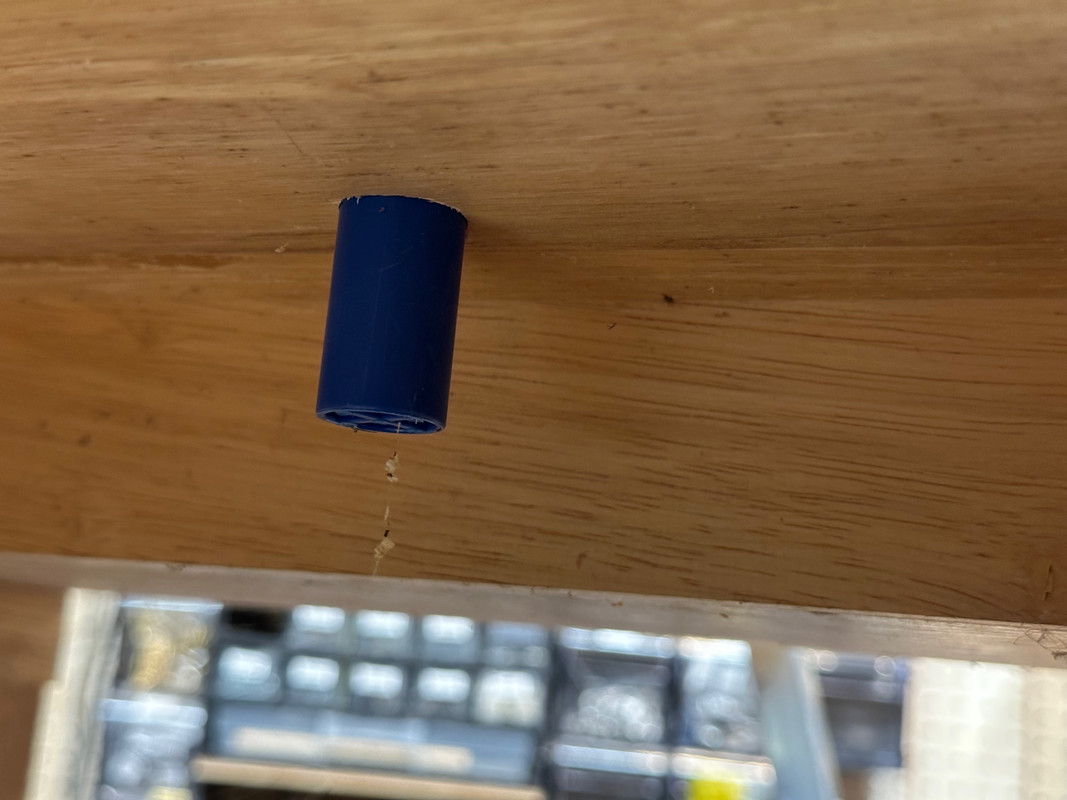 The tabletop is 3/4” thin, this bench dog is 2” tall so most of it is exposed.