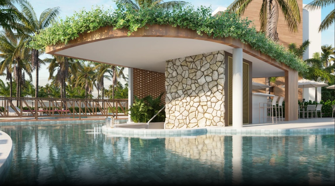 Bar molhado integrado à piscina principal do resort