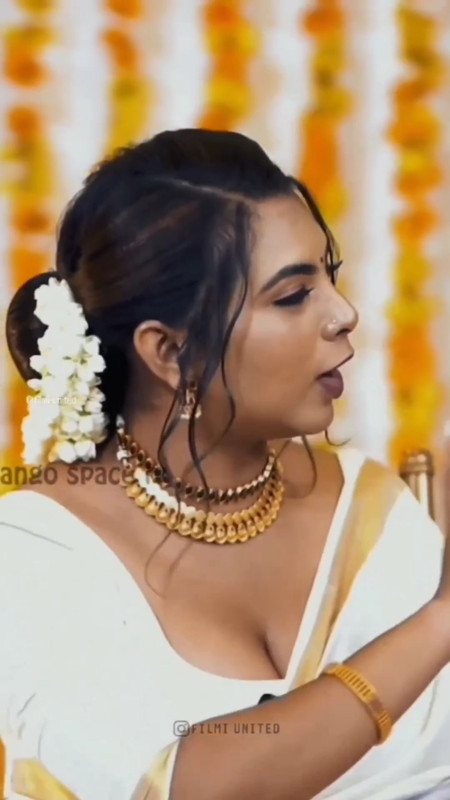 Mallu anchor sexy big boobs and cleavage in white sareee.mp4_snapshot_00.15.558