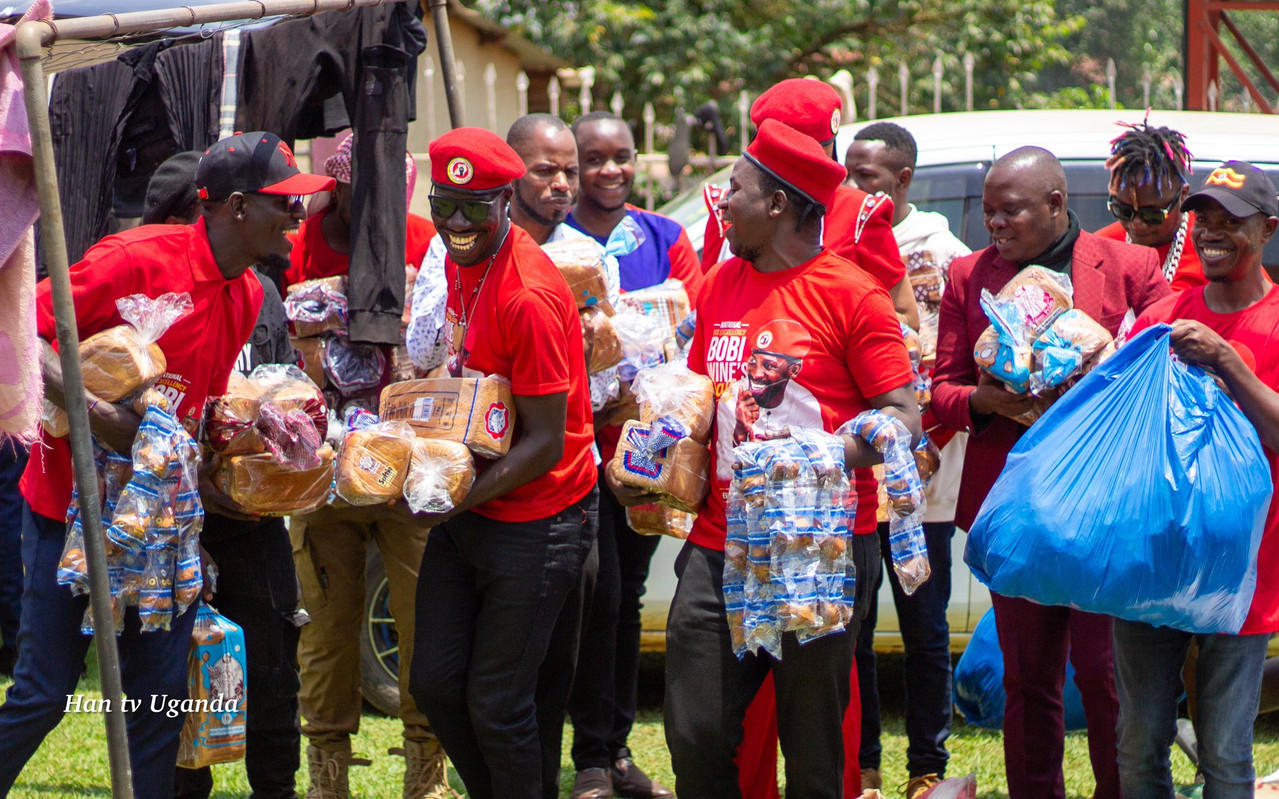 NUP supporters reaching out to RACH UGANDA with essential needs .