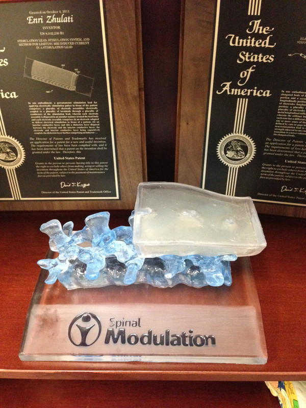 Two patents received by Enri Zhulati at Advanced Neuromodulation Systems and St. Jude Medical for medical device innovations