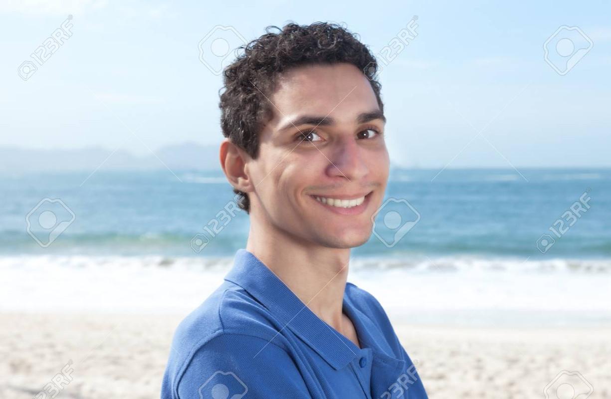 43065508-attractive-mexican-guy-at-beach