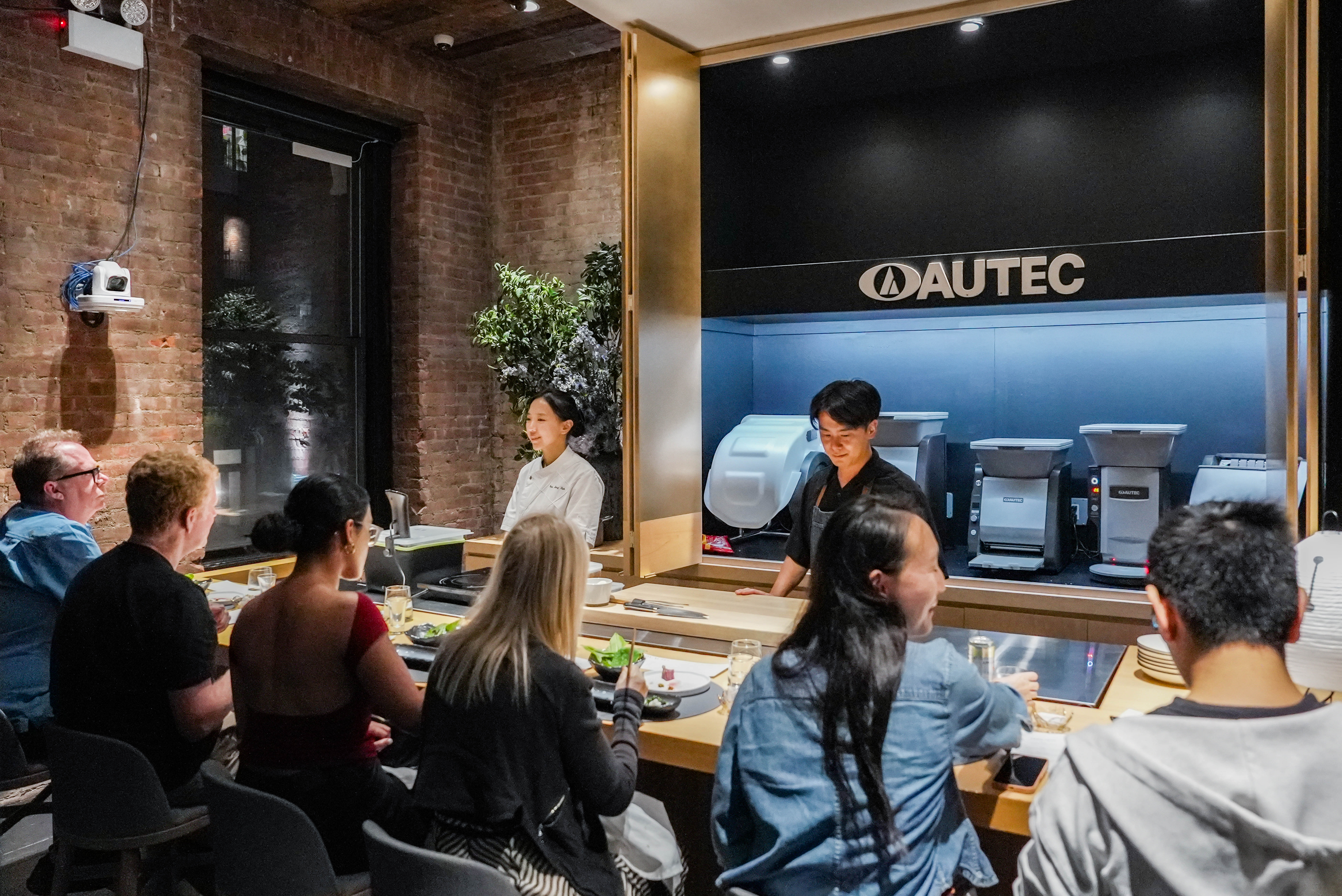 Chef Yoojung Suh and guests at the inaugural 12 by AUTEC event