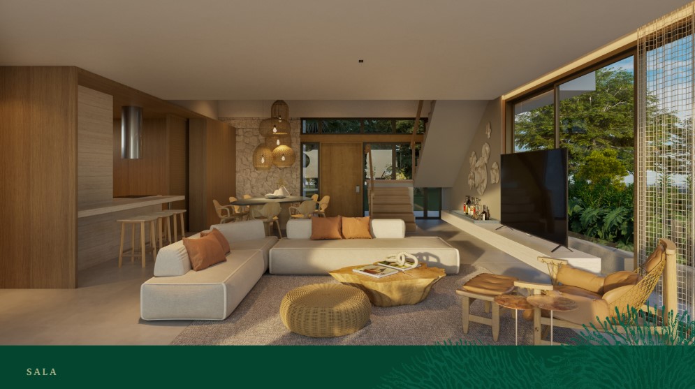 Sala de estar ampla com integração à varanda e vista para o mar