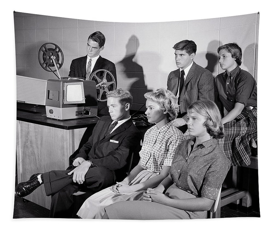 1950s-high-school-students-watching-16mm-educational-movie-in-classroom-panoramic-images