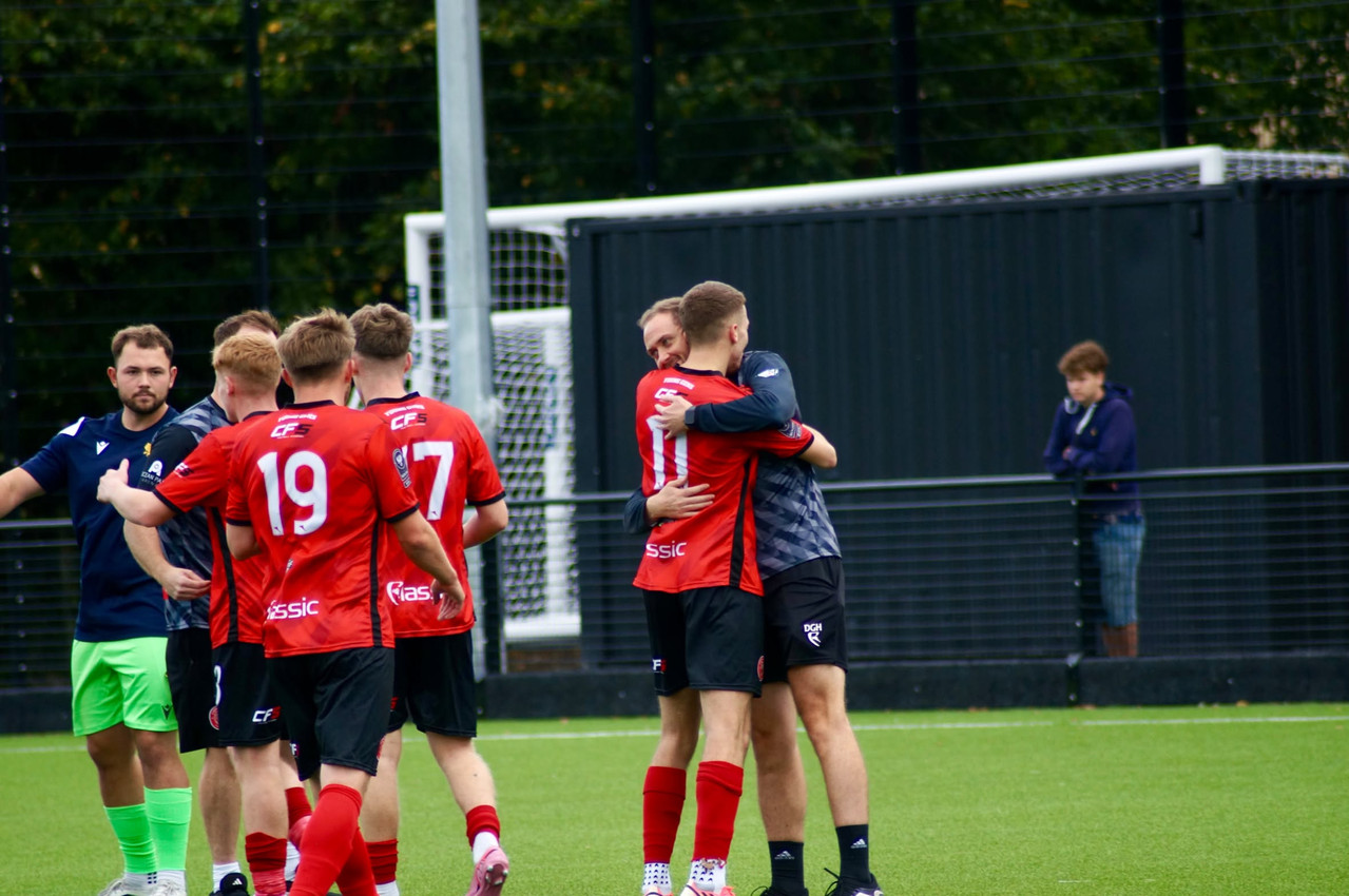 Caerau Ely celebrate at the full-time whistle after beating Treowen Stars in the Cymru South