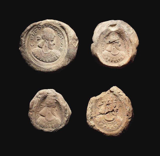 four-sasanian-pottery-bullae-circa-5th-7th-century-ad.jpg