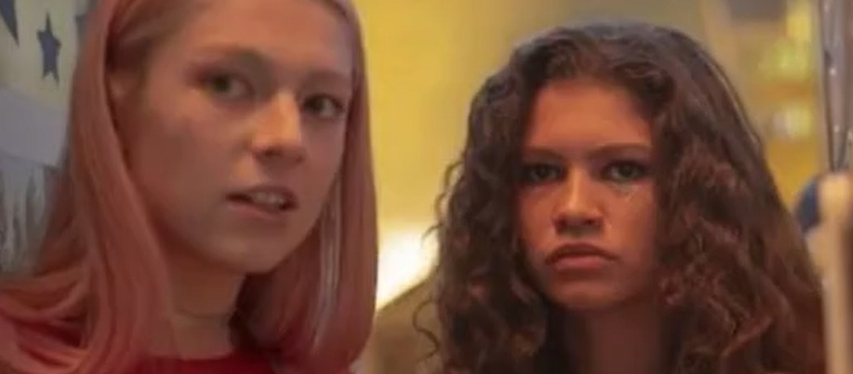 Two Girls One Pops Out Her Juicy Tits