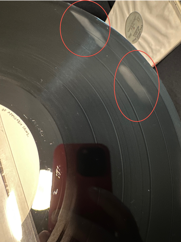 Cloudy white streaks/smears on vinyl do you have this? Steve