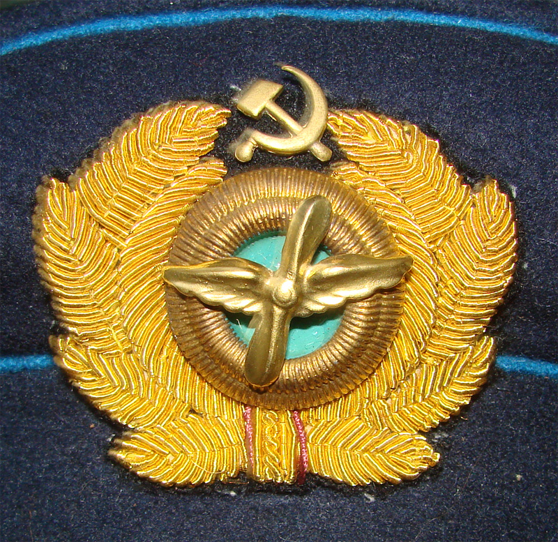 кокарда золотистая новодел 36 г. обр