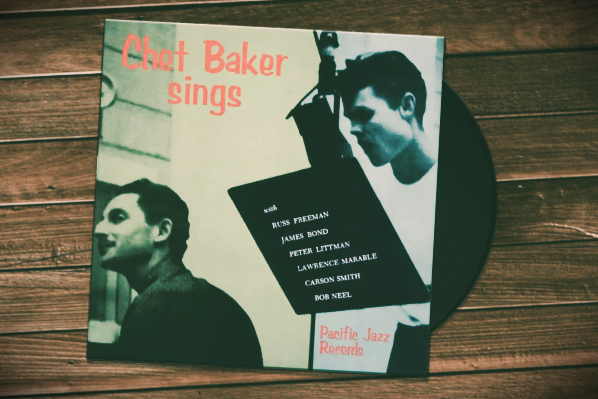 A photograph of the Chet Baker Sings vinyl album sitting on a wooden coffee table.