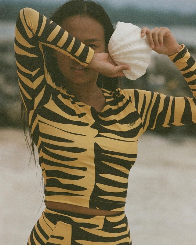 swim_assrt247 @janicethitran caught on film by @samantheeyo wearing our BO swimsuit in jungle print