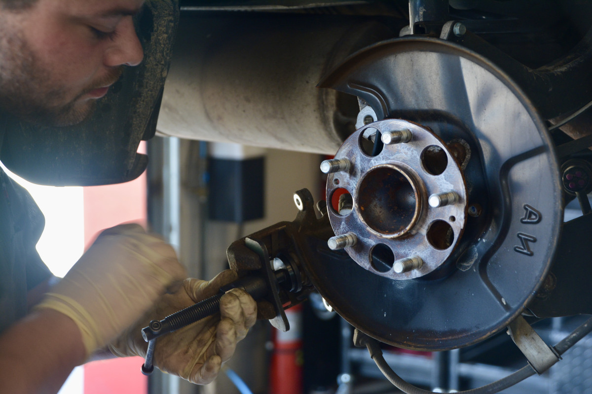 Why do my disc brakes pull to one side?