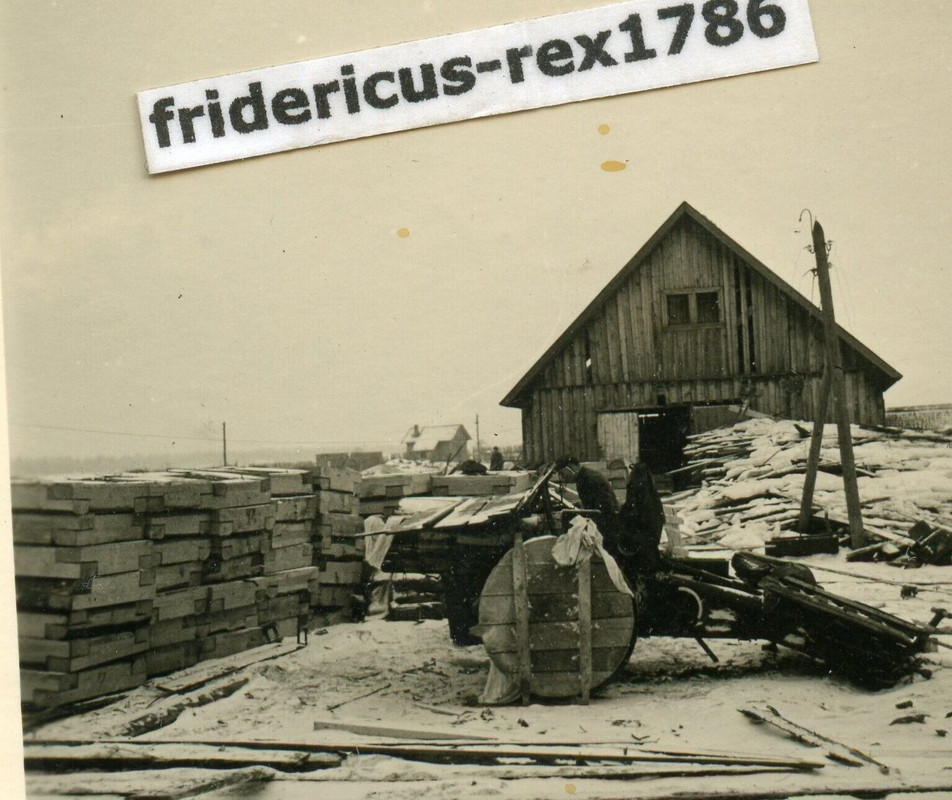 Fotos WH HKL Ostfront Winter Geschütz Kanone mit Holz abgetarnt Stellung