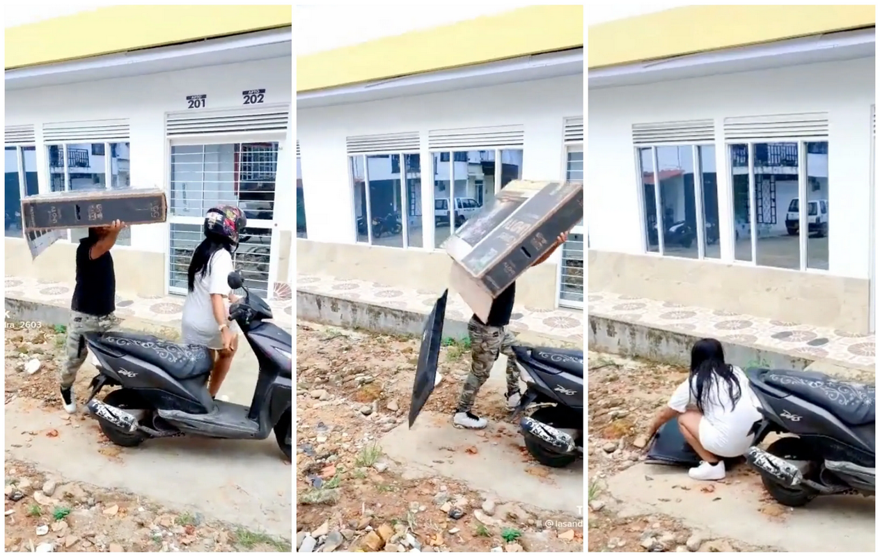 Quisieron llevar una TV en la moto y se les cayó por no cerrar la caja