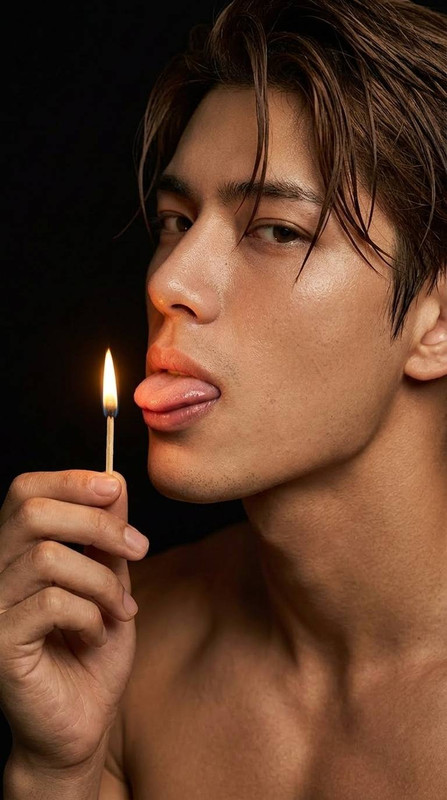 Man holding lit match 202605090941