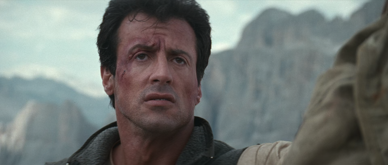 Cliffhanger (1993) RM4K + Extras (1080p BluRay x265 10bit AAC 5.1 r00t) [QxR]