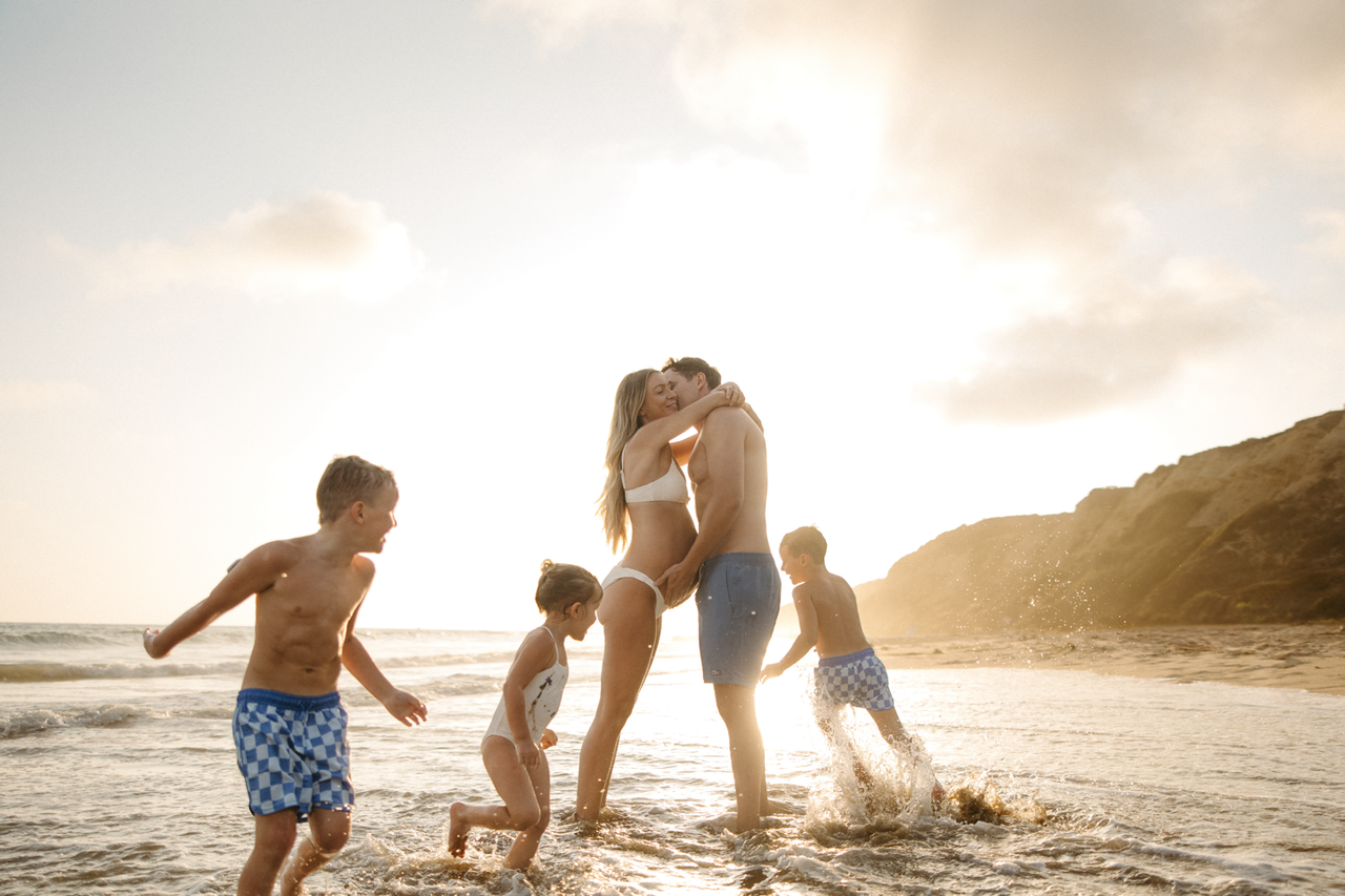Ev with her family at the beach