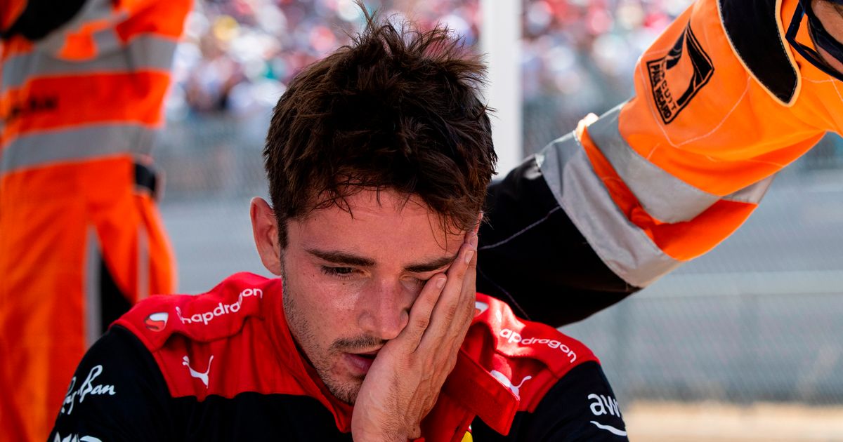 Charles-Leclerc-consoled-by-stewards-aft