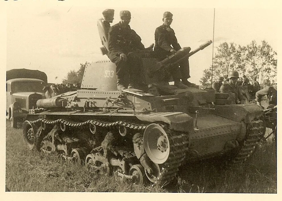 BEST German Panzermen Topside on Pzkw 35(t) Panzer Tank Passing in Field (1)