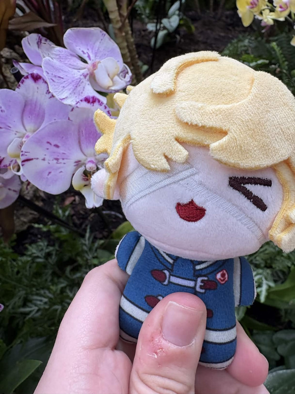 florian plushie with some flowers