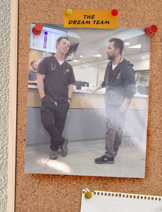 A photo of Jack and Robby stood by the main hub in the Pitt together. It is pinned to a noticeboard with the dream team written above