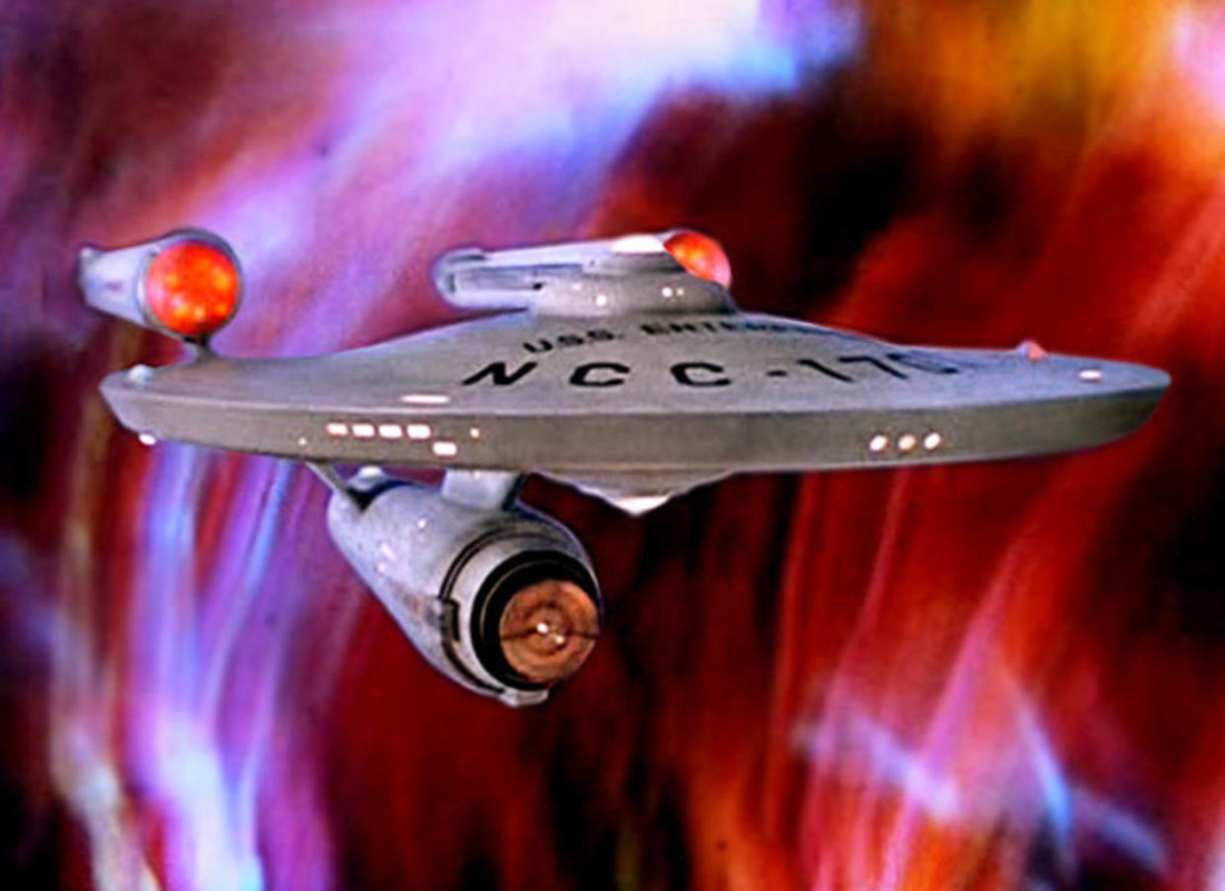 The USS Enterprise (NCC-1701) from Star Trek the Original Series, on a pink and orange streaked background.  It looks like lightning bolts are shooting at the Enterprise.