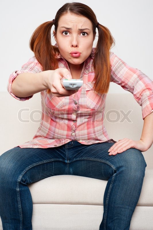 https://www.colourbox.com/preview/3528506-woman-sitting-on-sofa-and-watching-tv.jpg