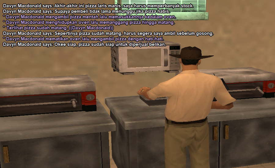 Memanggang-pizza-kedalam-oven.png