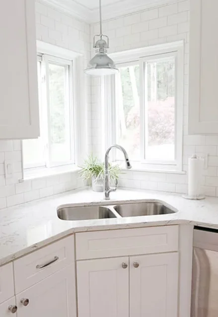 andrea-elizabeth-designs-corner-sink-with-window-view.webp