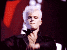 billy-idol-flesh-for-fantasy.gif
