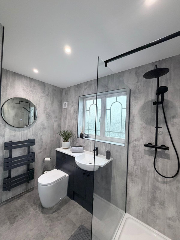 Finished modern bathroom renovation with contemporary details