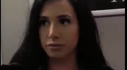 A Sexy Babe In A Black Bra Pushing Her Big Hot Tits Out.