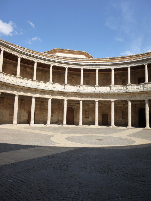 Circular building, open to the sky, with regular pillars.  Guide books describe it as renaissance-style.