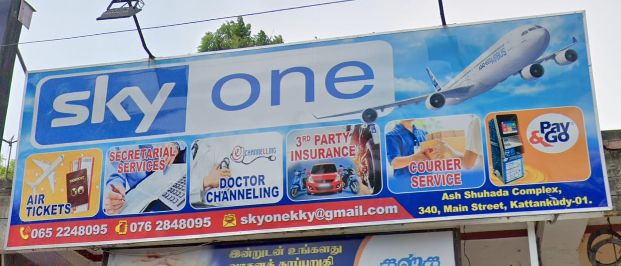 Sky One outdoor sign board on Main Street, Kattankudy