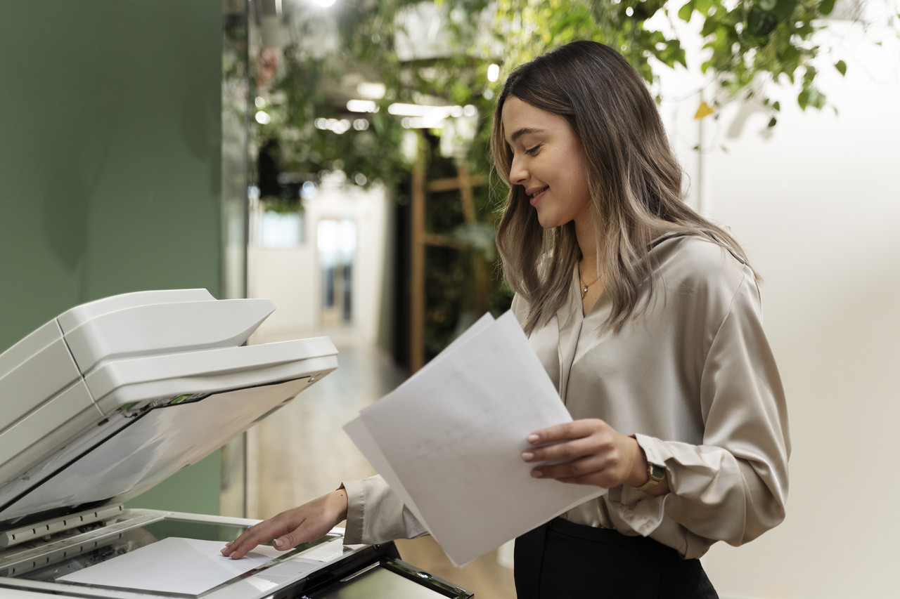 medium shot smiley woman holding paper
