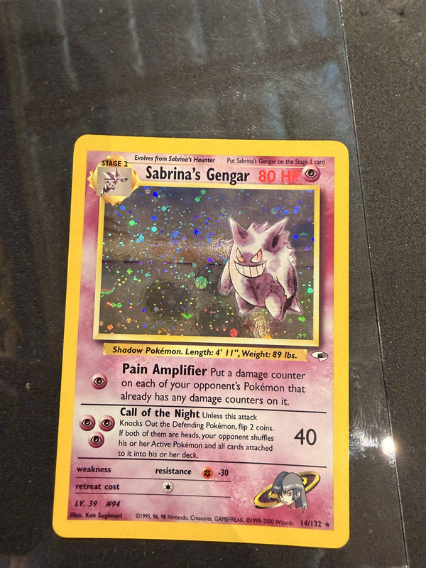 restored Pokémon card after cleaning and polishing showing clear holographic gloss
